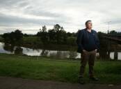 Shane Hamilton, businessman and the president of Maitland Business Chamber, beside the Hunter River. Picture: Jonathan Carroll 