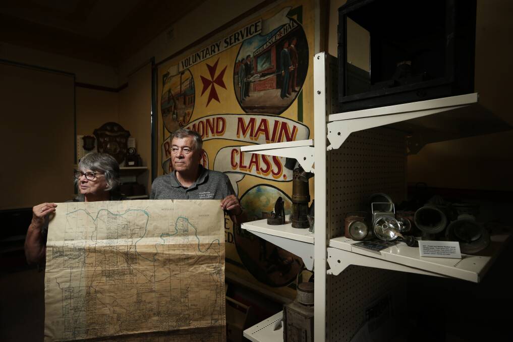 Bill Holland, right, at the Coalfields Local History Association's headquarters at Abermain. Picture: Simone De Peak