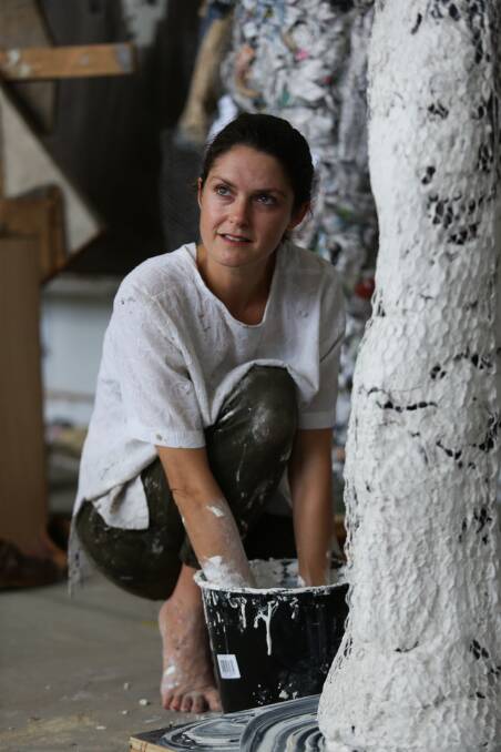 SHAPING HISTORY: Newcastle artist Lottie Consalvo working on her sculpture for an exhibition at Melbourne's Heide Museum of Modern Art. Pictures: Jonathan Carroll 