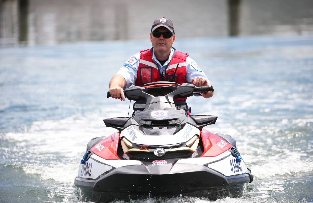 PATROL: Paul Hearfield, from Transport for NSW, on a Maritime jet ski. Picture: Peter Lorimer 