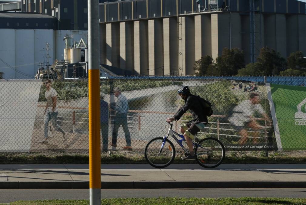 RIDING REFUGE: A cyclist rides on the footpath along Honeysuckle Drive, a common practice in Newcastle at the moment, even though it is illegal. 