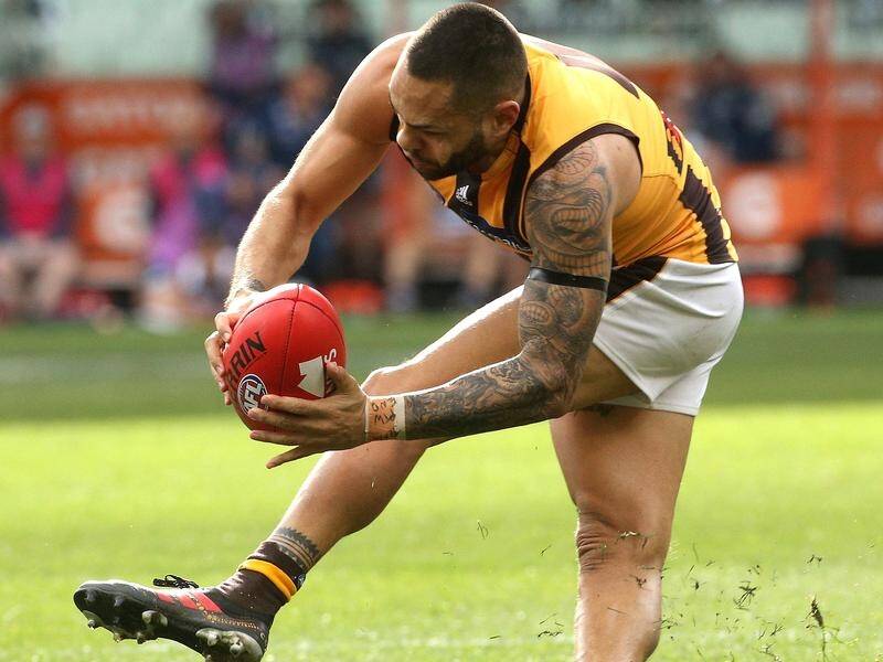Hawthorn's Jarman Impey hyperextends his knee during the moment that has ended his AFL season.