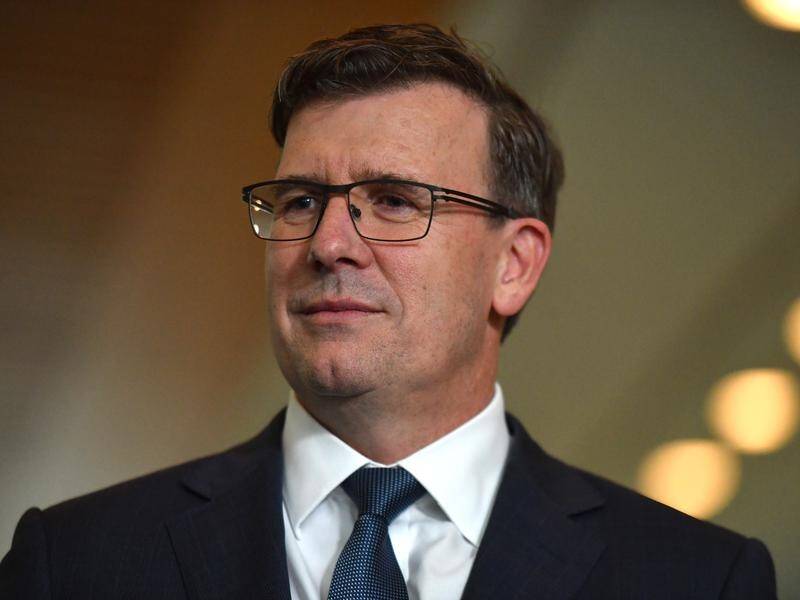 Federal minister Alan Tudge says international medical students will be allowed to work extra hours.