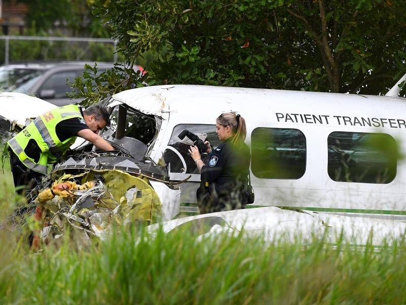 The crumpled wreckage south of Brisbane shows significant damage to the plane's cockpit. (Jono Searle/AAP PHOTOS)