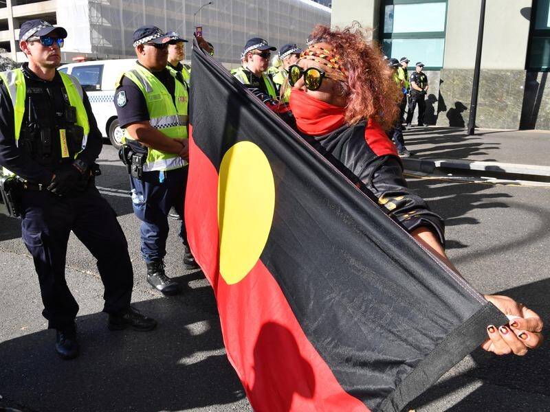 A crowd has gathered outside a Brisbane prison to demand an end to Indigenous deaths in custody.