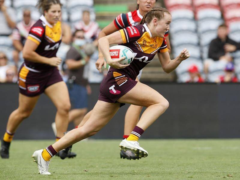 Tamika Upton (r) excelled as Brisbane trounced the Sydney Roosters in their opening NRLW match.