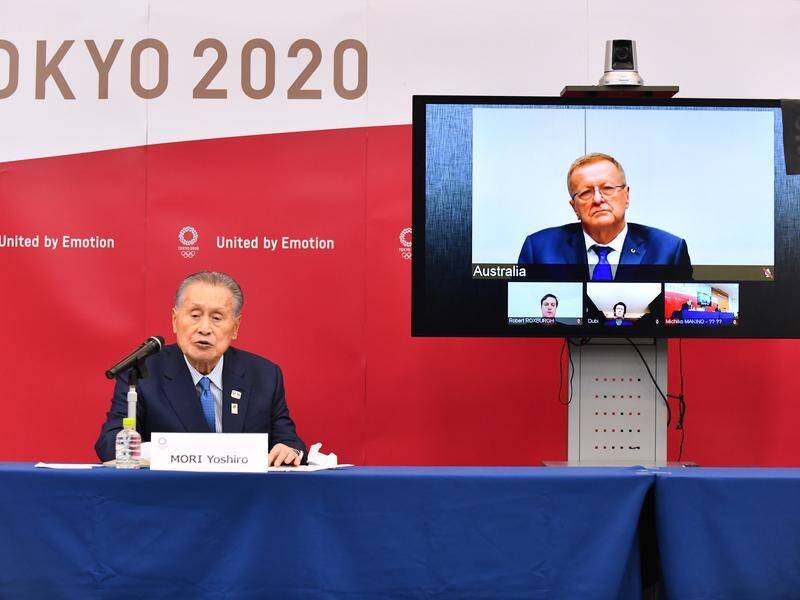 Tokyo 2020 president Yoshiro Mori (L), with John Coates (R, on the screen).