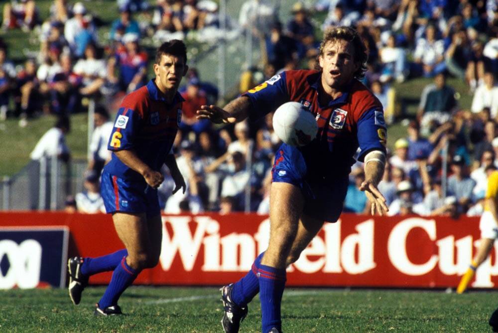 Robbie McCormack off-loads Newcastle Knights 1994. Picture: File