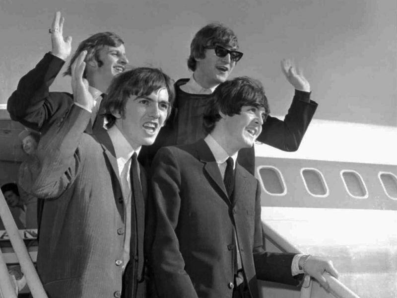 Beatlemania was in full swing in 1964. They toured Australia after releasing their first album. (AP PHOTO)
