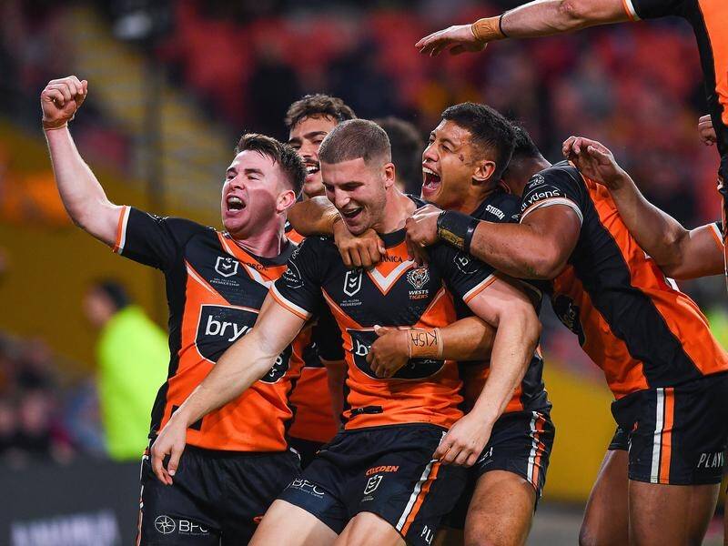 Wests Tigers have shocked Brisbane with a 32-18 NRL win that lifts them off the bottom of the table. (Jono Searle/AAP PHOTOS)