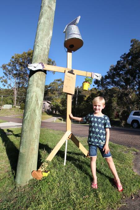  Smith Davies with the scarecrow he created for the Wangi Scarecrow competition.