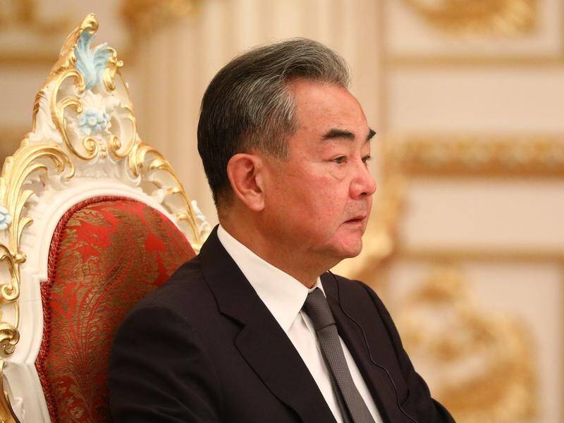 China's Foreign Minister Wang Yi has praised his country's friendship with Russia as "rock solid".