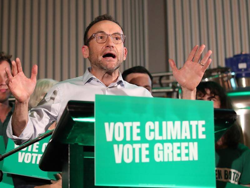 Greens' Adam Bandt wants future governments prevented from lowering emissions-reduction targets. (Jono Searle/AAP PHOTOS)