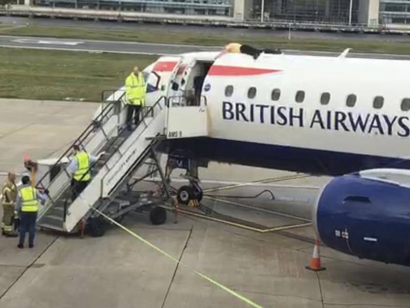 Former paralympian cyclist James Brown lay down on top of a British Airways jet in London.