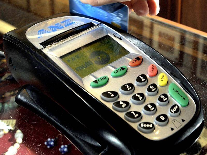 The cashless debit card scheme is government-sanctioned financial abuse, a hearing has been told. (Alan Porritt/AAP PHOTOS)