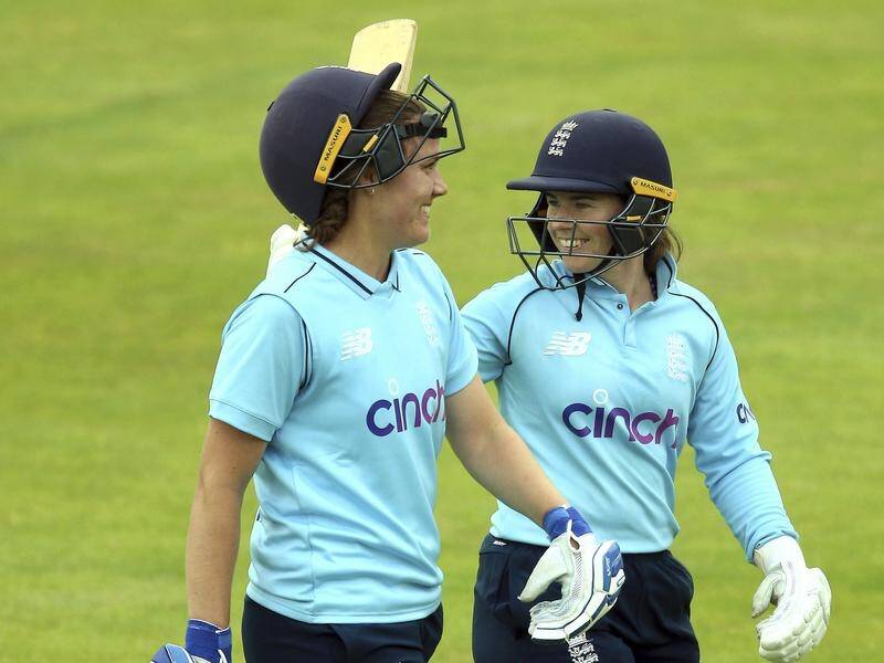 Nat Sciver (l) top scored with 55 as England beat India in their rain-affected T20 match by 18 runs.