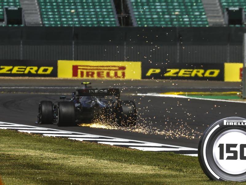 Lewis Hamilton won the British Grand Prix on three wheels at Silverstone after a last-lap puncture.