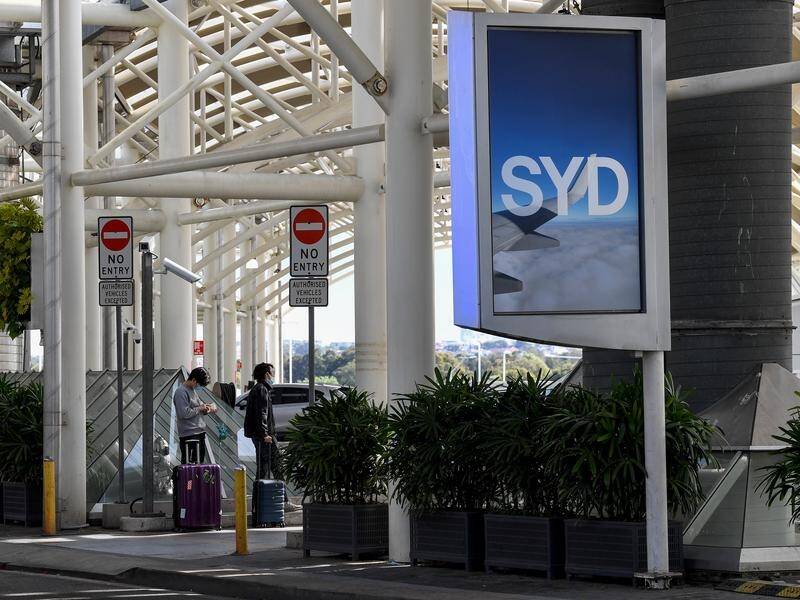NSW Health says two people with measles visited Sydney International Airport while infectious. (Bianca De Marchi/AAP PHOTOS)