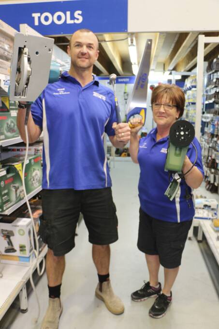 HANDS ON: Lake Timber and Hardware Mitre 10 Toronto owner Shane Dhu and retail manager Gina Pittard. Picture: David Stewart