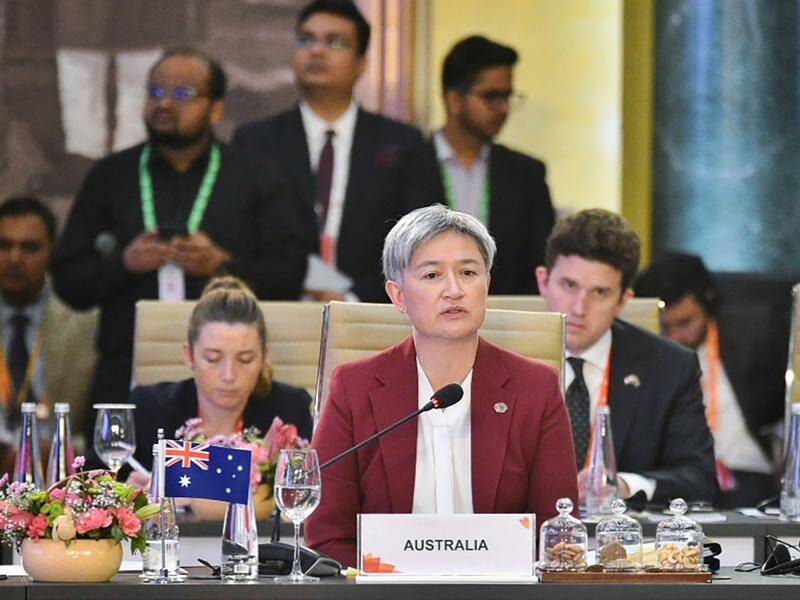 Penny Wong and China's Qin Gang have held talks on the sidelines of the G20 meeting in India. (EPA PHOTO)