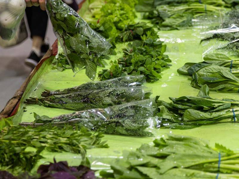 Growers are urging shoppers not to be put off their greens, after a recall of some spinach products. (Diego Fedele/AAP PHOTOS)