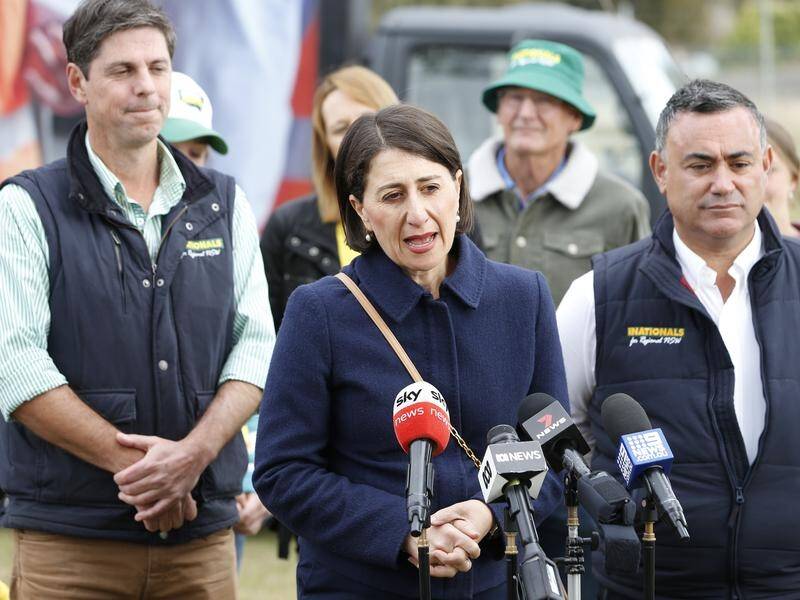 Gladys Berejiklian says she would welcome adding Dave Layzell (left) to her coalition government.