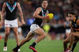Port Adelaide will be without Connor Rozee for their crunch clash against Carlton on Thursday. (Matt Turner/AAP PHOTOS)