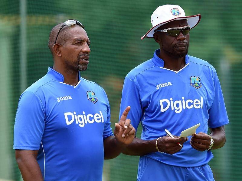 Phil Simmons (left), wants England to reciprocate the West Indies' recent favour of touring the UK.