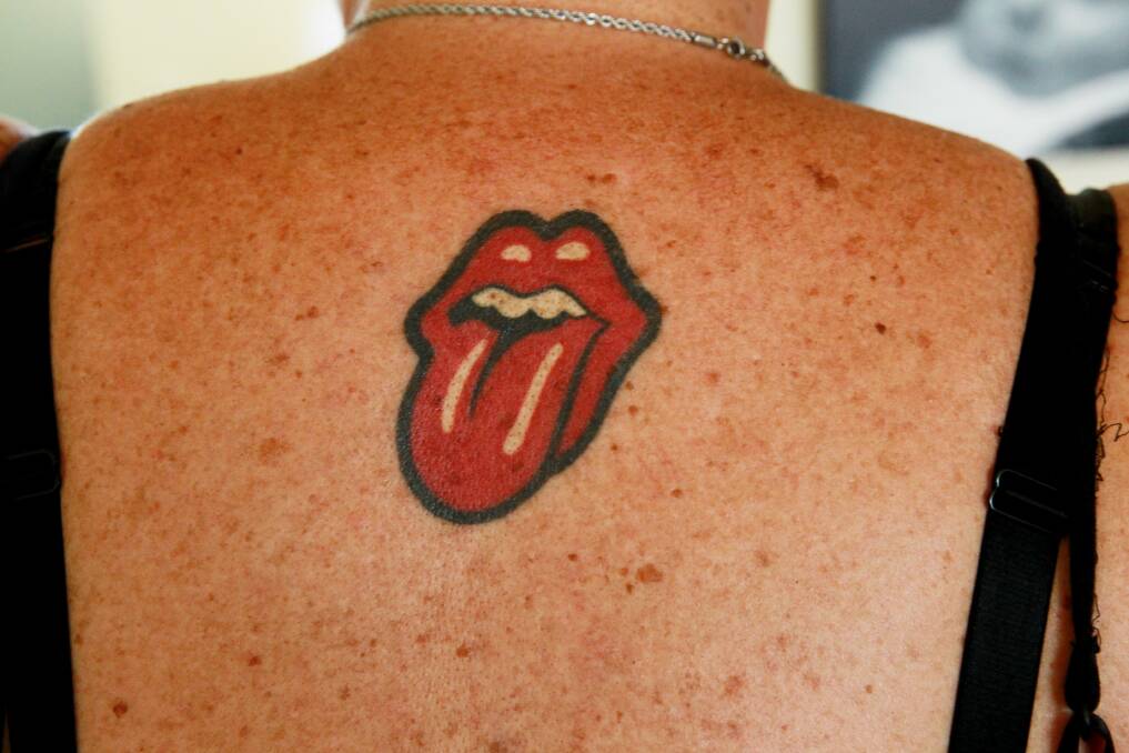 CAPTIVATED: Jillian Shearer shows off her iconic tongue tattoo. Picture: Ryan Osland