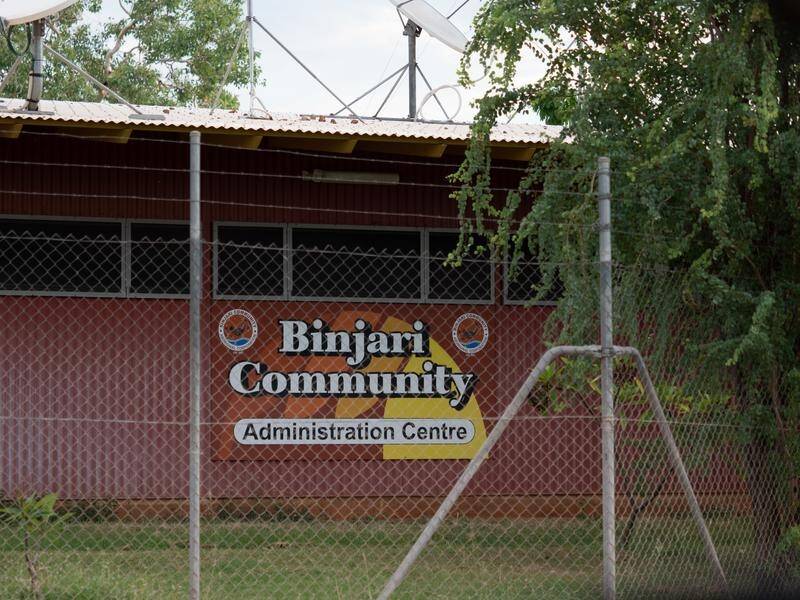 A lockdown in the NT Aboriginal community Binjari is being eased to a lockout.