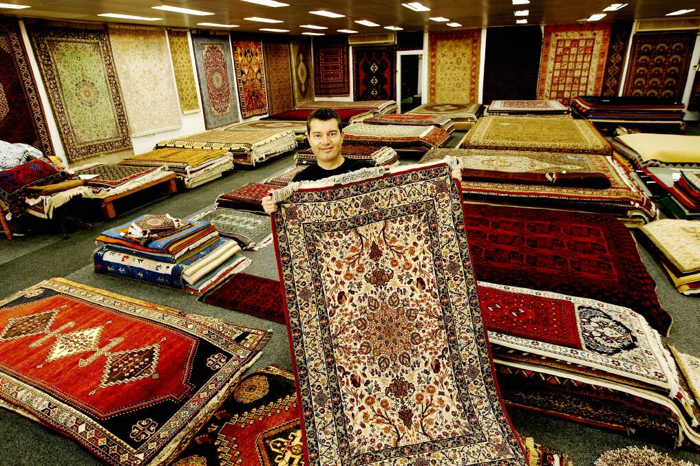 NCH   WEEKENDER ,  Word of Mouth.  Image shows Sam Rahani from Rahmani's Rugs in Parry street.14th March 2014     pic   Darren Pateman