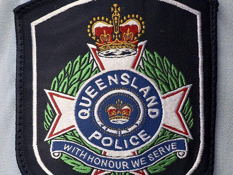 A police officer accused of indecently touching a female colleague says it was an accident.