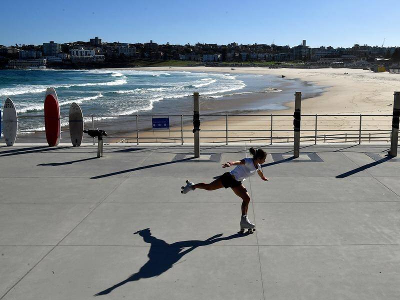 Bondi Beach will be open for swimming or surfing next week but no sunbaking will be allowed.