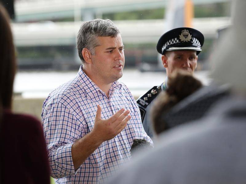 Police Minister Mark Ryan says Queensland media laws protecting reporters are a first step.