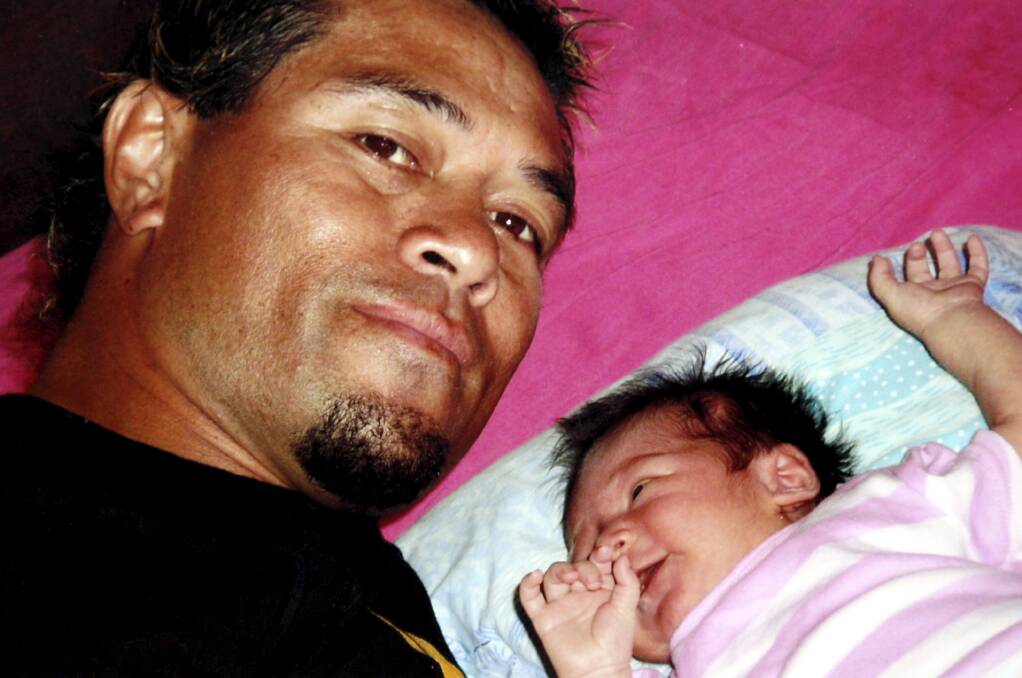 FATALITY: Agamalu Iosefa, who died in the accident, with his daughter Manaia.