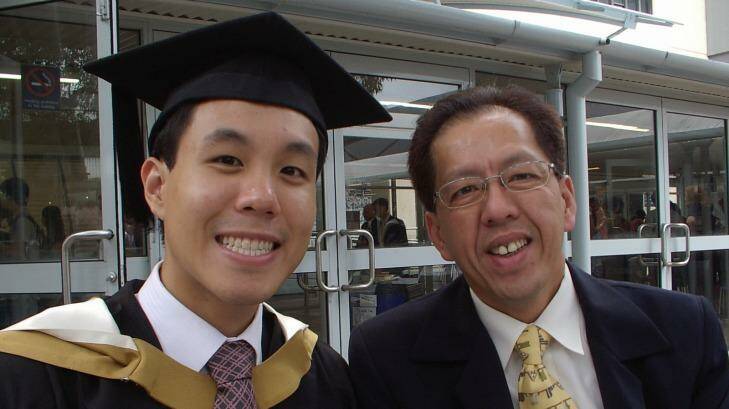 Alpha Cheng with his father Curtis, who was shot by a 15-year-old boy outside Parramatta police headquarters in October last year. Photo: Supplied