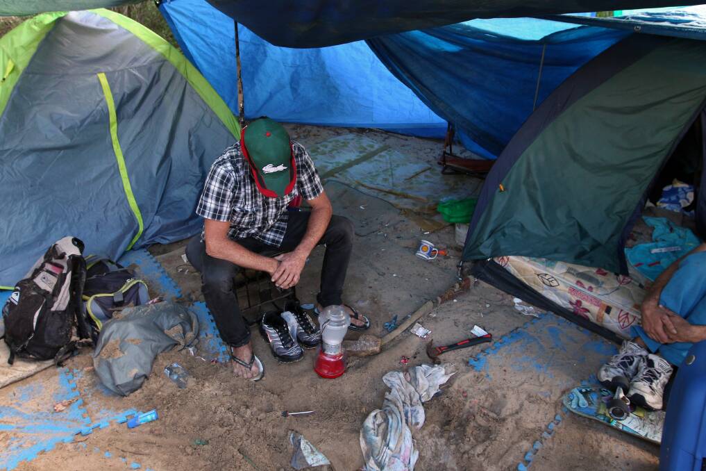 SHELTER: A homeless man at Camp Shortland, behind Horseshoe Beach.