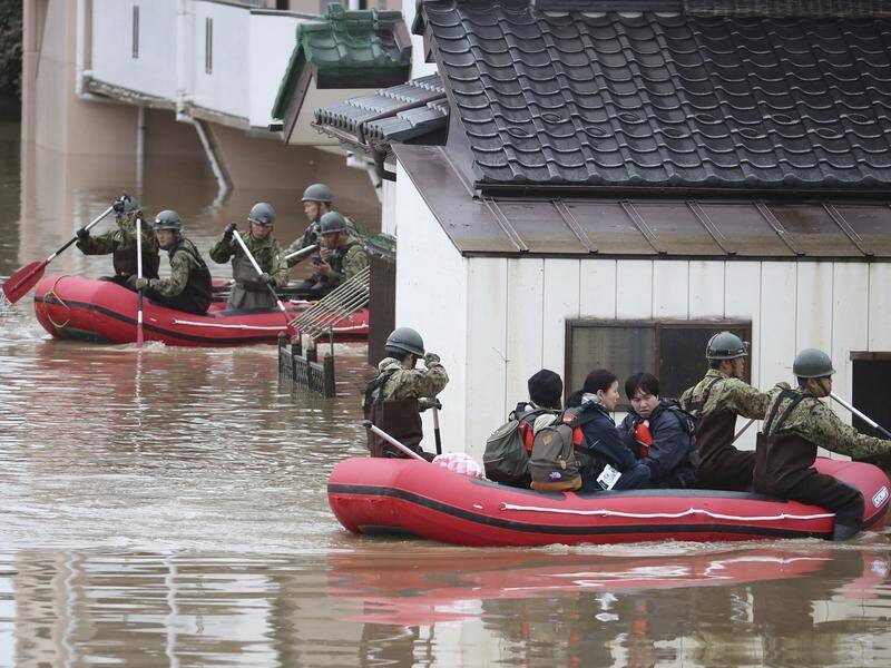 Japan's military conduct searches after Typhoon Hagibis, as the death toll rose on Tuesday to 58.
