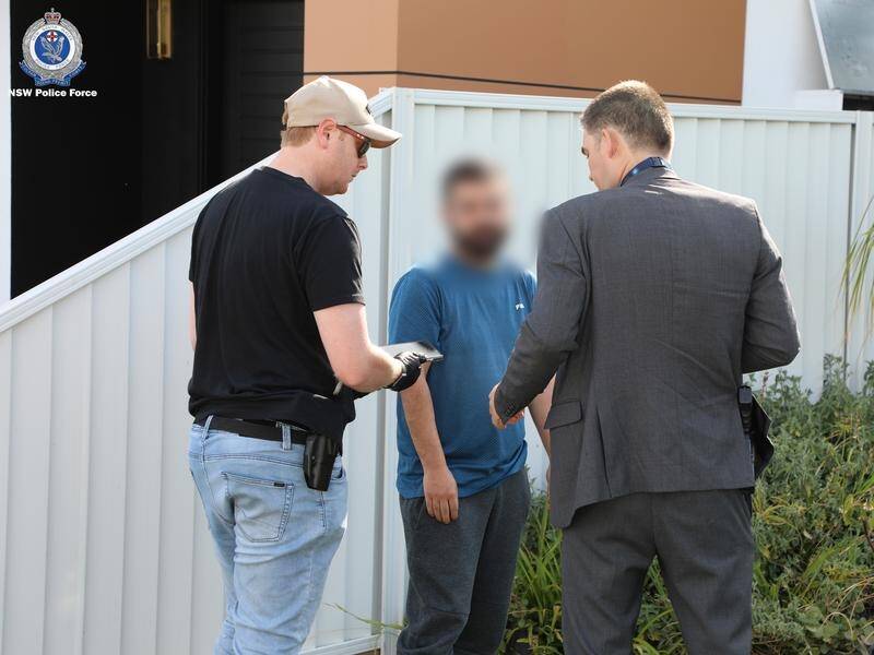 A man is arrested after allegedly defrauding his telco employer out of $3 million. (HANDOUT/NSW POLICE)