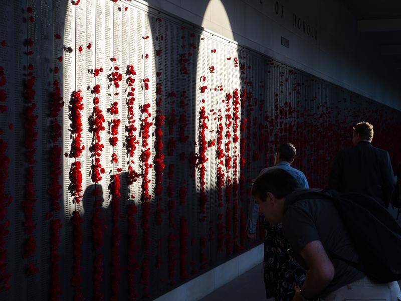 The Australian War Memorial boss has defended accepting cash from a Chinese-Australian billionaire.
