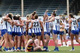 North's AFLW players are trying to become the club's first premiership-winning team this century. (Rob Prezioso/AAP PHOTOS)