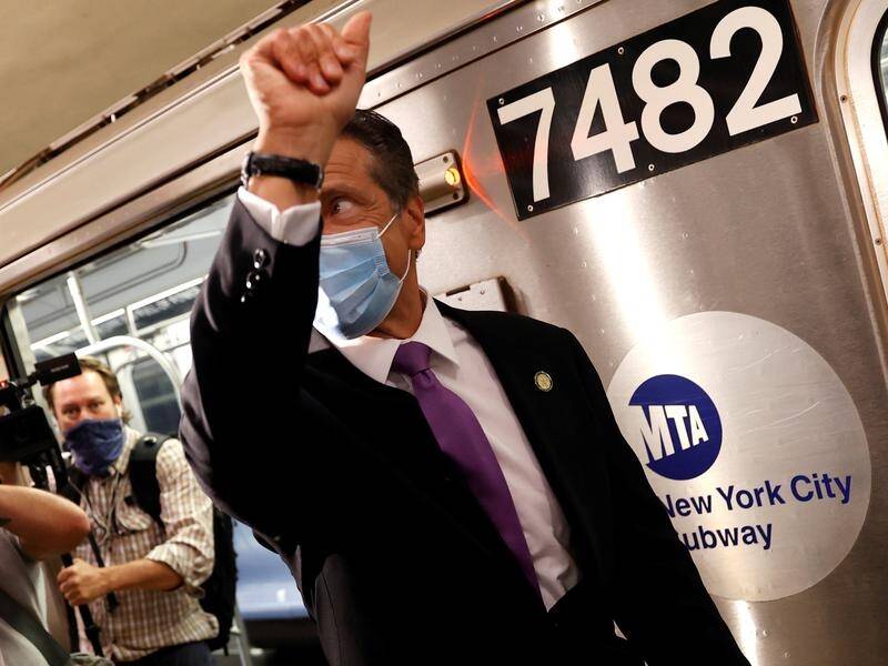 Governor Andrew Cuomo has ridden the subway in Manhattan as New York City begins reopening.