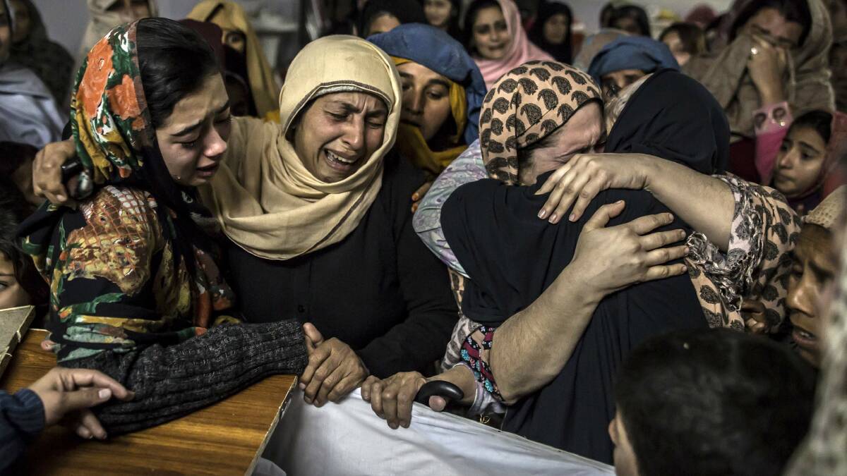 Women mourning after a Taliban attack on a public school in 2014, when a reported 132 students and nine staff were masacred by machine gun. Bloodshed, never absent, is again resurgent. Picture: Reuters/Zohra Bensemra 