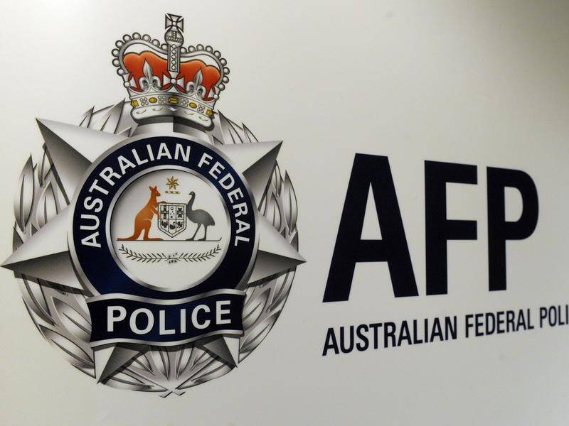 The AFP was part of a covert operation that's led to the arrest of a Canadian intelligence officer.