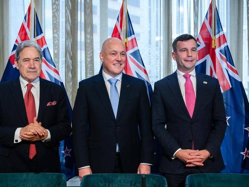 Winston Peters, Christ Luxon and David Seymour have reached a deal on New Zealand's new government. (Mark Coote/AAP PHOTOS)