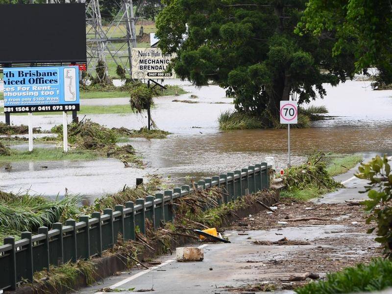 Flood warnings remain active in Queensland after widespread heavy rainfall in the past week. (Jono Searle/AAP PHOTOS)