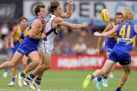Nat Fyfe wound back the clock with a fine midfield display in Fremantle's practice match win. (Richard Wainwright/AAP PHOTOS)