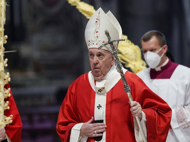 Pope Francis celebrates Palm Sunday Mass in Saint Peter's Basilica at the Vatican.