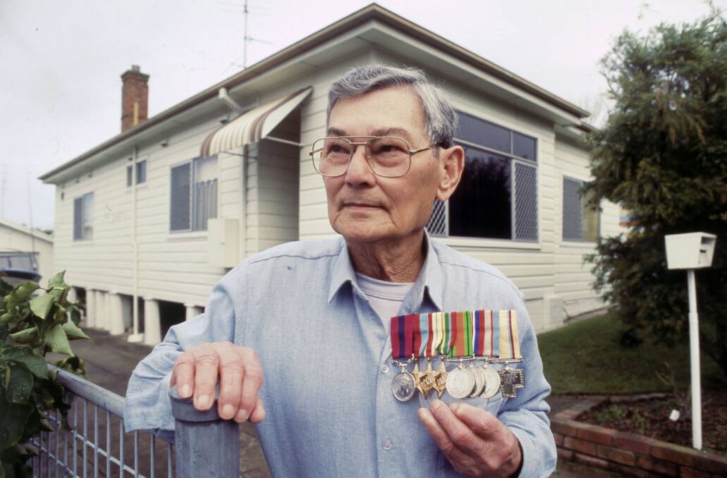 Fred Sanderson of Z Special Unit at his home in Charlestown with his medals in 1989. Picture Ken Robson.