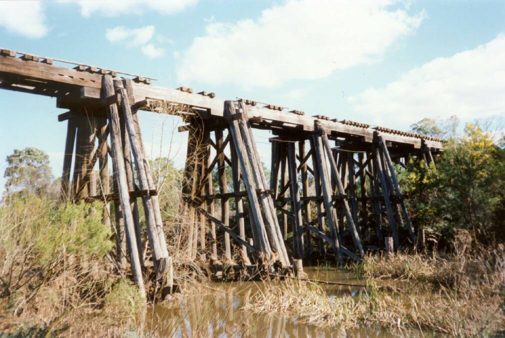 IN DECAY: The Wallis Creek timber trestle bridge on the old abandoned Richmond Vale Railway (RVR) line. 